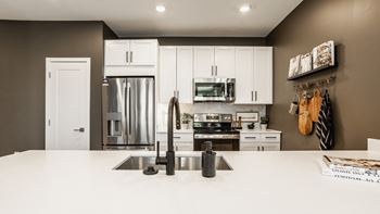 Kitchen With White Cabinetry And Appliances at Upper Vue Flats, Dublin